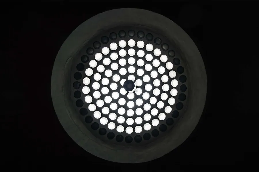 Circular rooflight made up of many small white circles.