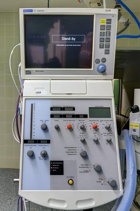 Medical machine with a monitor, controls and connections.
